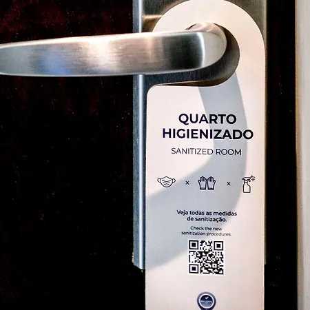 Grand Mercure Sao Paulo Vila Olimpia Exterior photo A door sign indicating a sanitized room